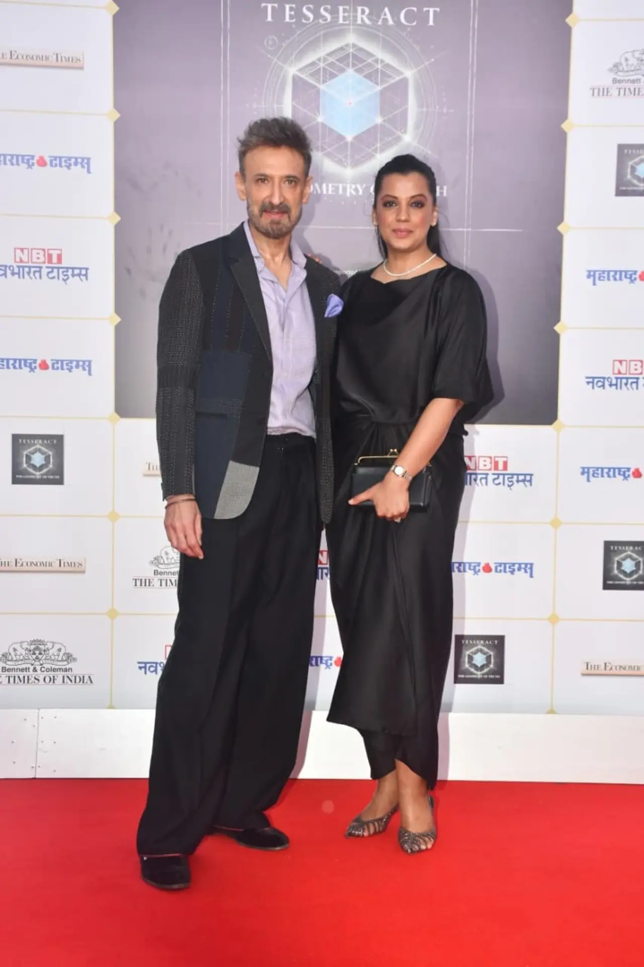 Rahul Dev and Mugdha Godse were spotted posing together on the red carpet in coordinated black ensembles. Rahul looked sharp in a textured blazer, while Mugdha opted for a chic satin black dress.